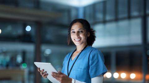 a nurse standing outside the hospital