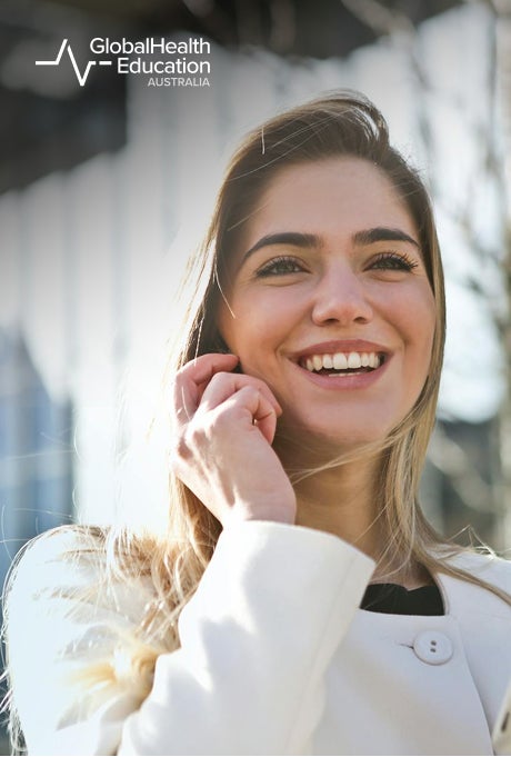 Global Health Education advisor speaking with student