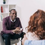 Counselor talking to his client