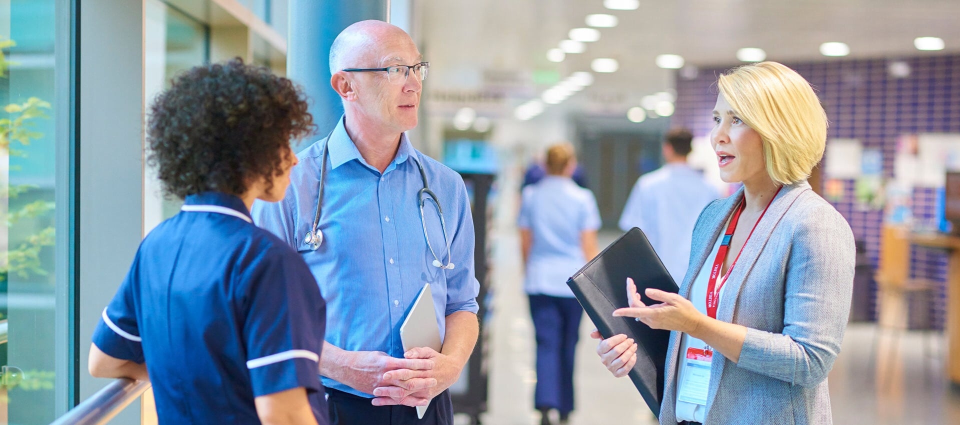 Healthcare administrator, doctor and nurse meeting.